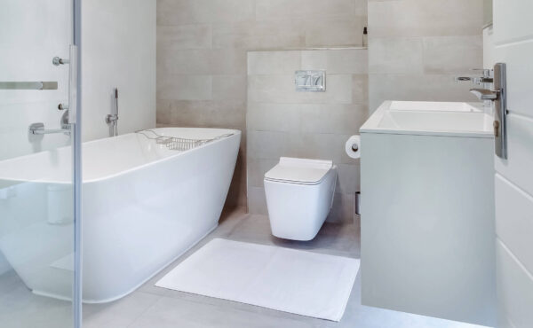 A modern bathroom with a white toilet board and box from Marmox Australia